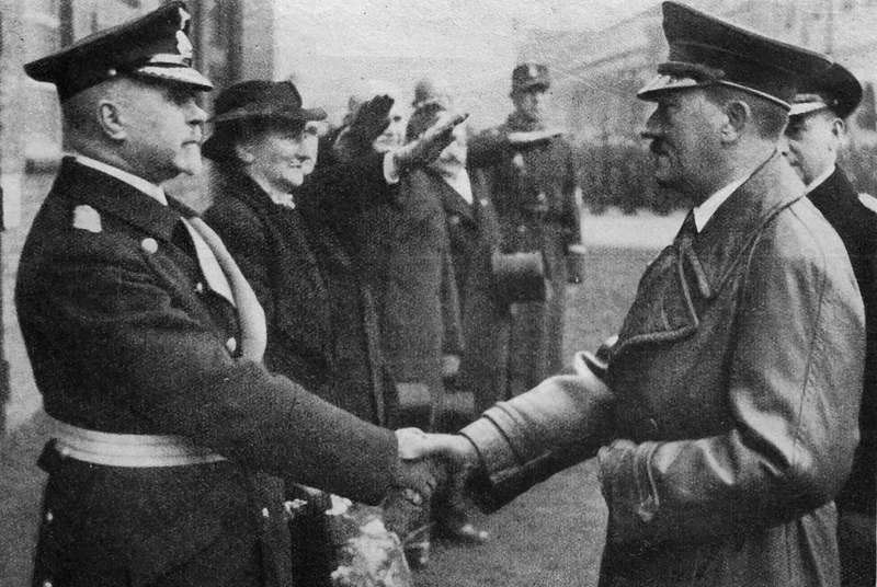 Adolf Hitler greets vice admiral Max Bastian at the launch of the Gneisenau battleship